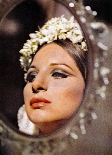 Streisand looks in mirror