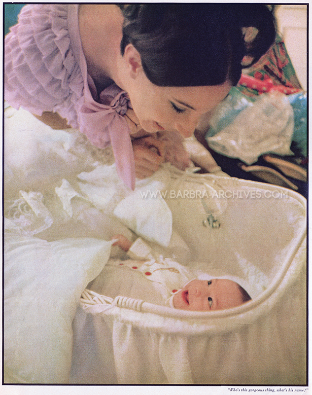 Streisand looks at her baby, Jason.