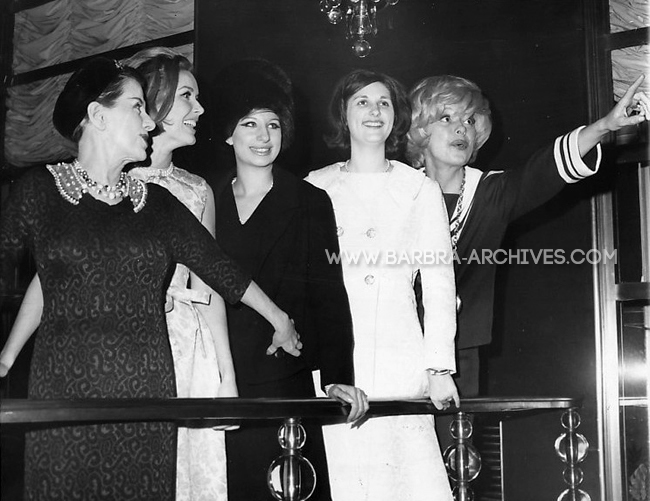 Streisand surrounded by Carol Channing and Lynda Johnson