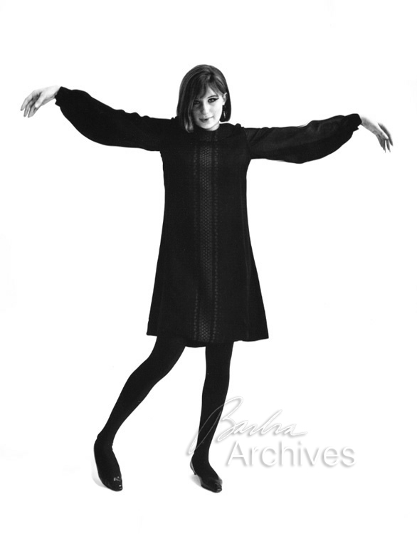 Streisand in black dress