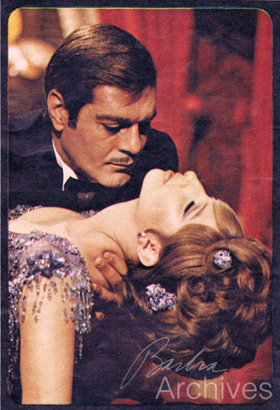 Omar Sharif kissing Barbra Streisand