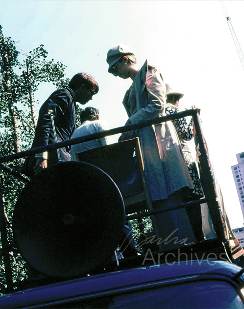 Streisand with Abzug atop truck
