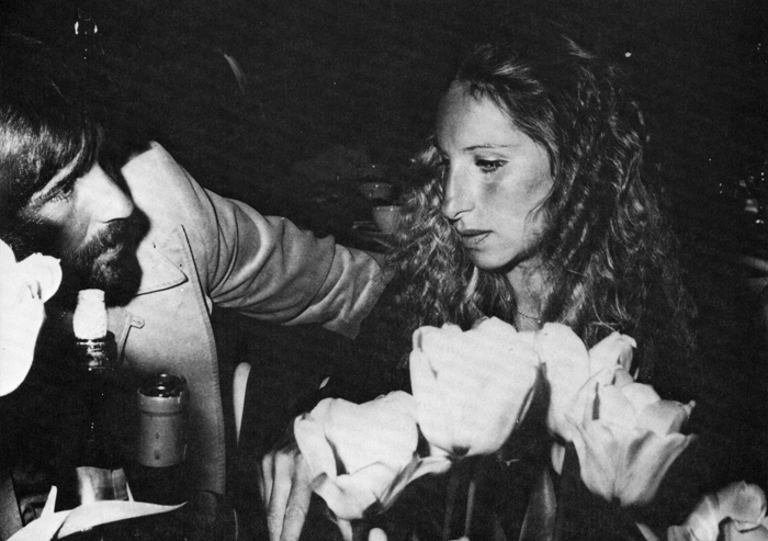 Peters and Streisand at table