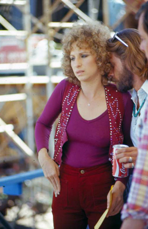 Streisand taking a break from filming at Sun Devil Stadium