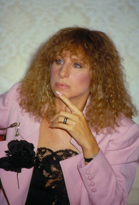 Streisand hold Crystal Awards certificate