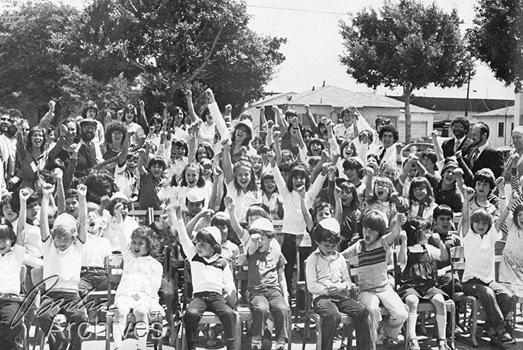 Streisand joins school children in a group photo