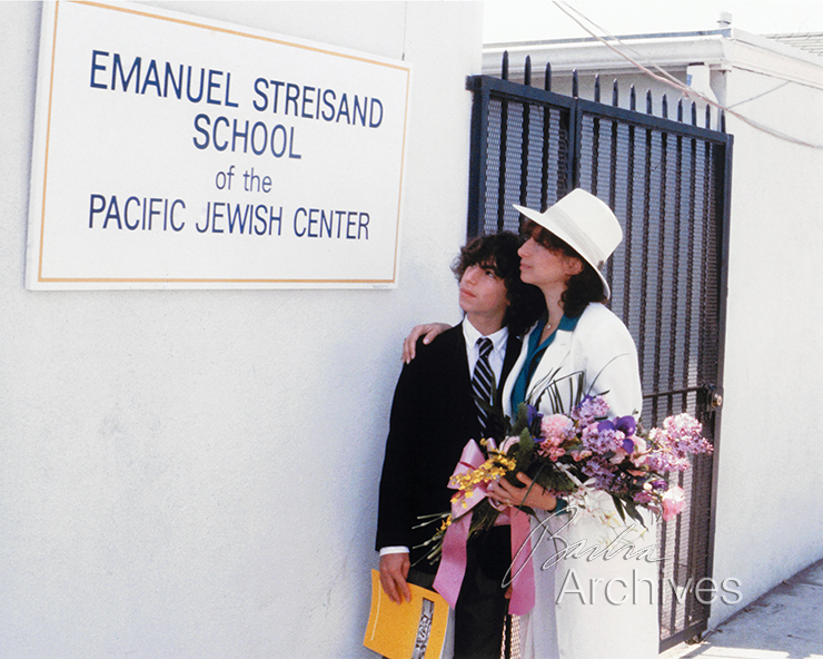 Streisand and son in front of dedicated building