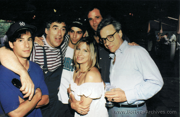 Streisand surrounded by the men in her life