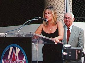 Streisand at microphone